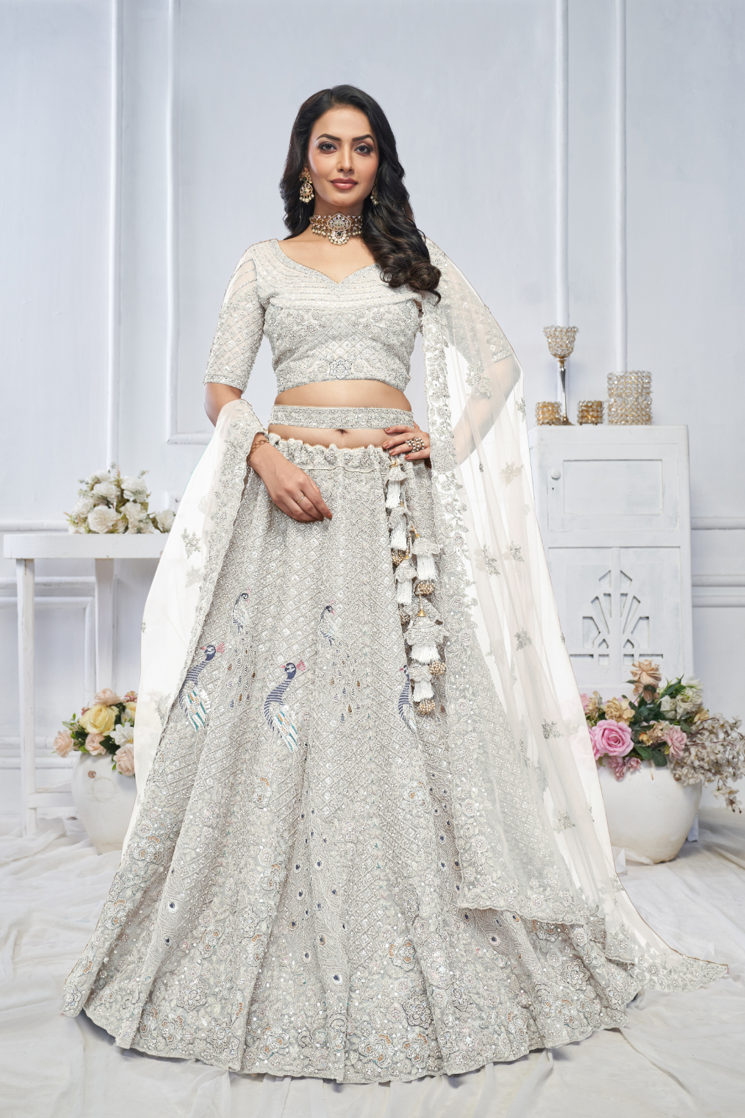 Whimsical White Embroidered Bridal Wear Lehenga with Floral & Peacock Motifs