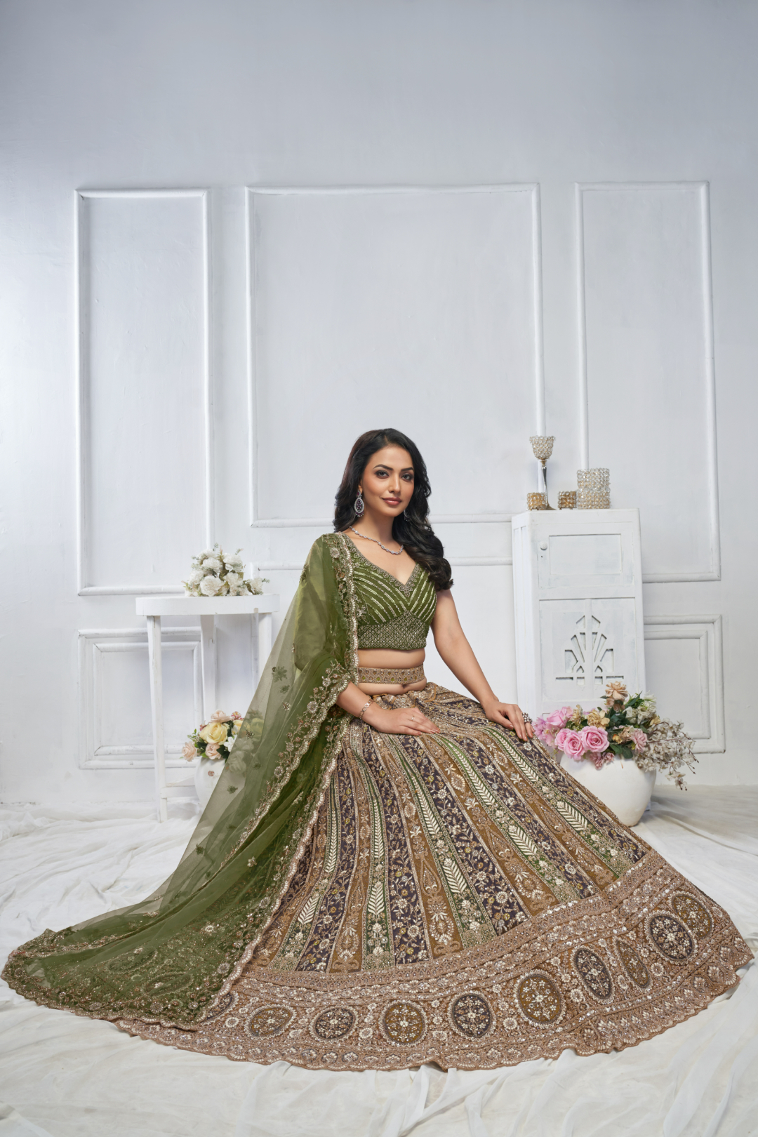Majestic Green Bridal Lehenga with Paisley, Floral, and Leaf Patterns