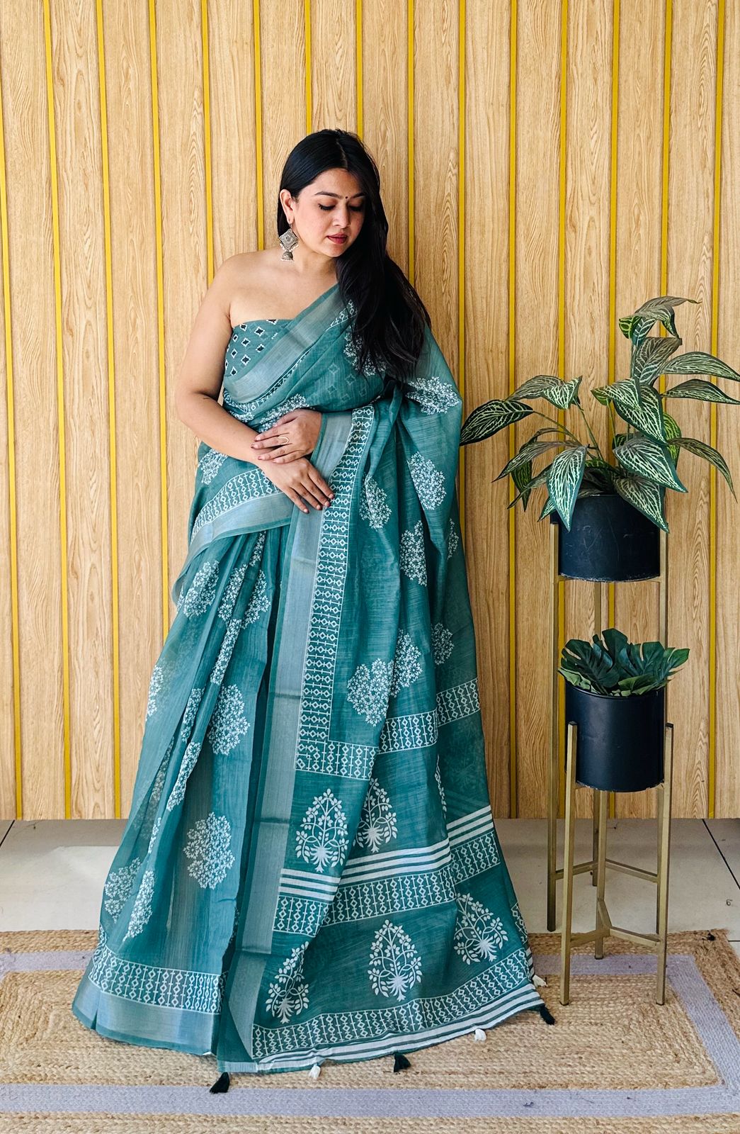 Soft Linen Cotton Silk Saree, featuring digital Batik print, woven silver border & printed pallu. Comes with a matching printed blouse. Price: ₹695/-. Premium Assured Quality!