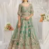 Vardan Ethnic Sea Green Tissue with Heavy Sequin Work Designer Wedding Lehenga