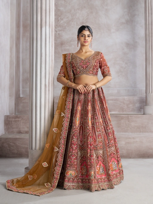 Vardan Mocha-Colored Aari Embroidered Banarasi Wedding Lehenga #VardanEthnic #WeddingLehenga #BanarasiSaree #AariEmbroidery #BridalWear #TraditionalElegance #BridalLehenga #LuxuryBridalWear #IndianFashion #BridalLook #IndianWedding #DesignerLehenga #LuxuryEthnic #EthnicWear #WeddingCollection #SareeLove #BanarasiLehenga #WeddingSeason #BridalShopping #IndianBridal #DesignerBridalWear