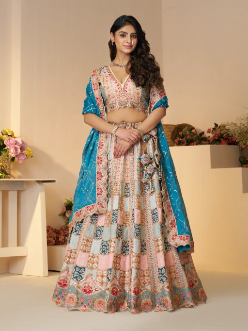 Vardan Ethnic Multi-Pastel Powder Blue Party Wear Lehenga,powder blue party wear lehenga, multi pastel lehenga, dola silk lehenga with sequin work, position print jaal lehenga, designer lehenga for weddings, Vardan lehenga collection