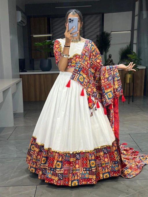 Vardan Ethnic White Navratri Full Stitched Chaniya Choli Collection,Navratri Lehenga Choli Navratri Chaniya Choli Collection Chaniya Choli for Garba Night Navratri Special Lehenga Wholesale Navratri Lehenga Choli,Mirror Work Chaniya Choli Traditional Gujarati Chaniya Choli Cotton Lehenga Choli for Navratri Garba Dance Lehenga Collection Navratri Lehenga Manufacturer in Surat,Buy Navratri Lehenga Choli Online in Bulk Best Navratri Chaniya Choli Designs for Garba Wholesale Chaniya Choli for Navratri Festival Designer Lehenga Choli for Dandiya Nights Navratri Lehenga Choli at Wholesale Prices